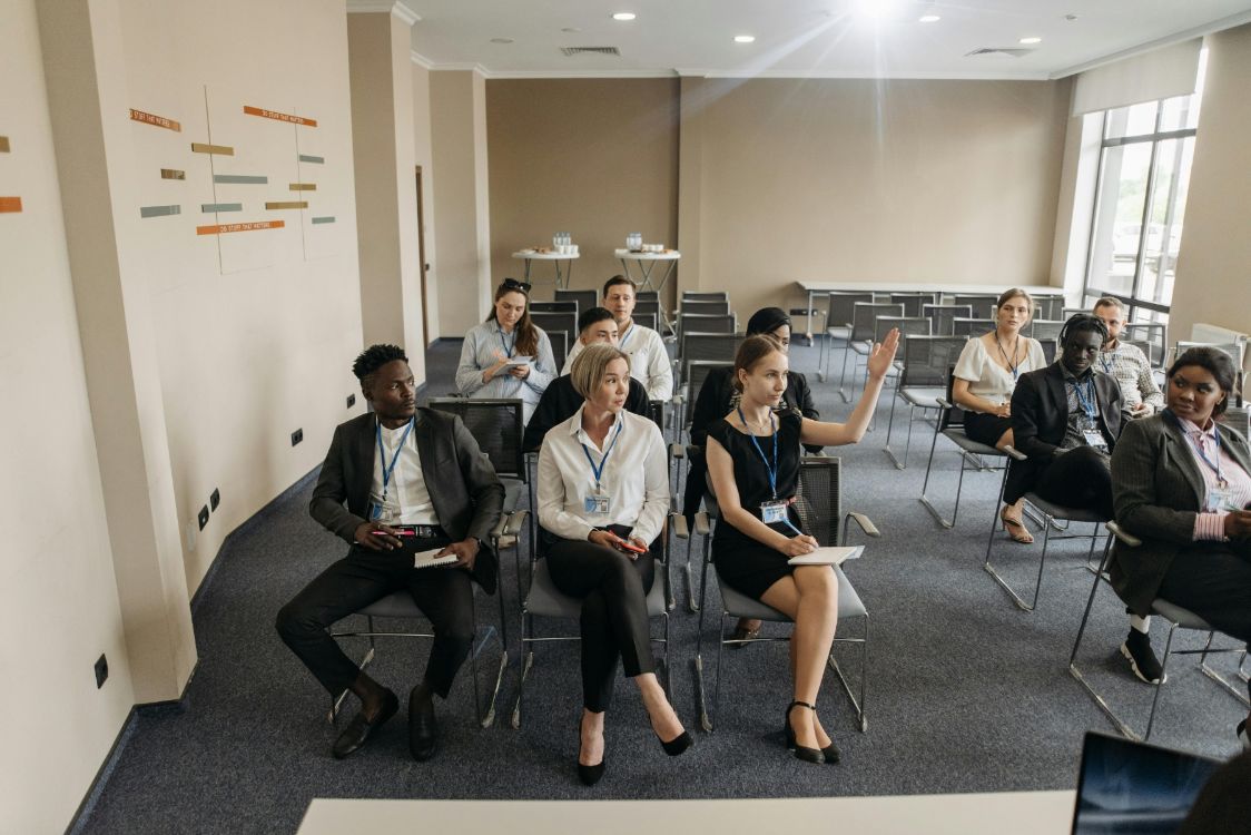 Group of aspiring managers in classroom setting.